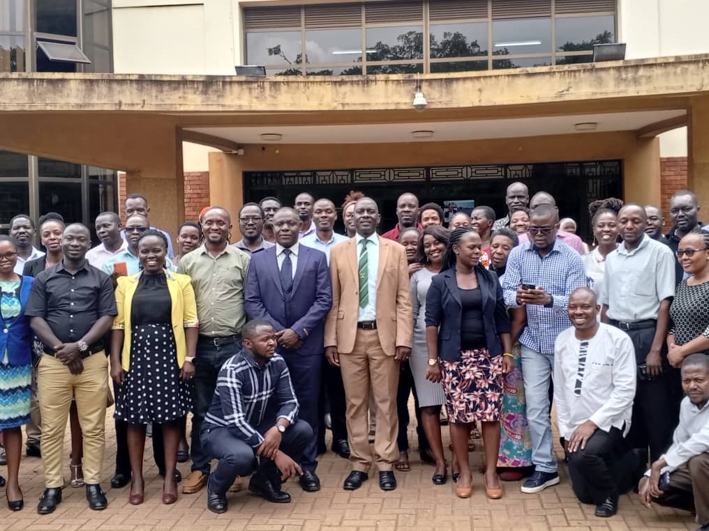 Director of Graduate Training Prof. Julius Kikooma (Mak branded neck tie) together with some of the participants.